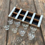 CARL AUBÖCK, 8 Schnapsgläser in Halterung