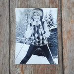 Fotografie Skifahrerin mit Pelzkappe